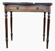 Reproduction mahogany fold-out card table with dummy drawers below, on turned reeded supports,