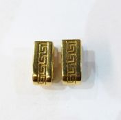 Pair of 14K gold loop earrings,