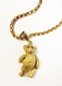 9ct gold teddy bear pendant, set with gems on a 9ct gold chain,
