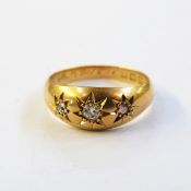 18ct gold and diamond three-stone ring inscribed to shank, size N approx., 4.