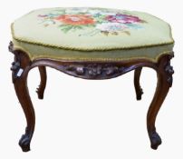 Victorian mahogany upholstered footstool, the upholstered seat on moulded cabriole legs,