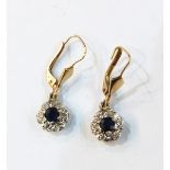Pair of 18ct gold, diamond and sapphire flower-shaped drop earrings,