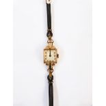 Art Deco-style gold-coloured twin-strap wristwatch