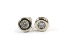 Pair of 14ct gold and diamond stud solitaire earrings