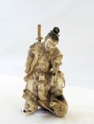 Japanese carved ivory figure of Samurai slaying a boar, 8.