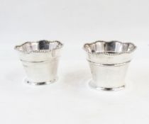 Near pair of early 20th century silver bowls with wavy beaded rim, tapered body,