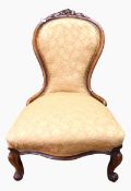 Victorian upholstered nursing chair on cabriole supports