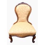 Victorian upholstered nursing chair on cabriole supports