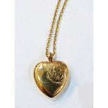 9ct gold heart-shaped locket on chain with engraved decoration, 6.