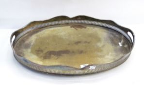 EPNS two-handled tray, oval, with pierced gallery border, having gadrooned serpentine edge,