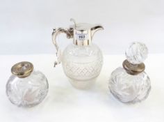 Pair of cut glass globular scent bottles, with white metal bead pattern necks,