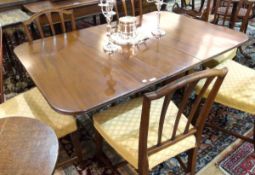 Victorian mahogany dropleaf dining table, rectangular with curved corners, ring turned supports,