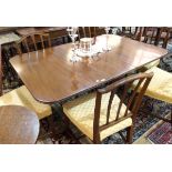 Victorian mahogany dropleaf dining table, rectangular with curved corners, ring turned supports,