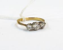 Yellow gold and three-stone diamond ring,