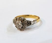 18ct gold and diamond cluster ring, the centre diamond surrounded by eight smaller diamonds,