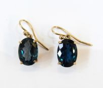 Pair of gold and teal coloured gemstone (possibly synthetic) earrings