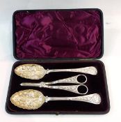 A Victorian silver plate cased set of berry spoons, complete with grape scissors,