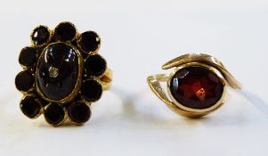 Antique gold and almandine garnet bar brooch set cabochon stone in oval setting and an antique gold