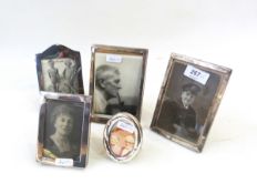 Pair of early 20th century silver photograph frames, rectangular (damaged),