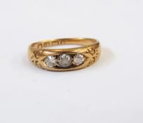 18ct gold and three-stone diamond ring with three gypsy set stones in scroll engraved mount