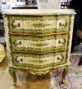 Continental gilt and painted chest of three long drawers, on cabriole supports,