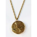 9ct gold circular locket on 9ct gold chain, the locket with engraved decoration, 23.