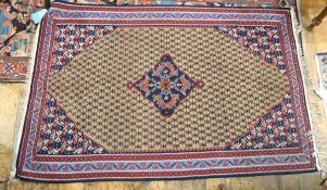 Iranian Kelim with central floral midnight blue lozenge, on a beige ground, with geometric motifs,