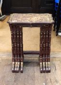 19th century Chinese quartetto nest of lacquered tables, gilt painted with landscape scenes,