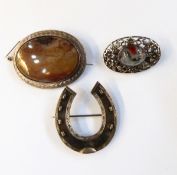 Silver-coloured brooch, oval, set with agate stone,