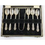 George V silver set of six coffee spoons with sugar nips, foliate pattern, boxed,