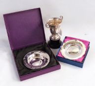 Silver two-handled trophy on circular base and two silver dishes, both by Carr's of Sheffield,