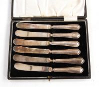 Set of six silver-handled afternoon tea knives, Sheffield 1931, with angular handles,
