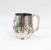 A Victorian silver plate mug; Aesthetic Movement decoration, Elkington & Co.
