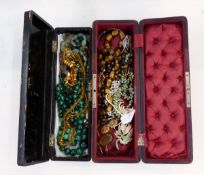 Leather jewellery case and contents of a single row coral bead necklace,