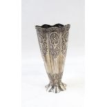 Persian white metal vase of tapering lobed form, with foliate decoration,