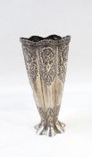 Persian white metal vase of tapering lobed form, with foliate decoration,