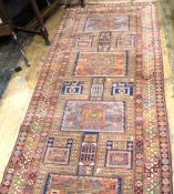 Axminster-style Persian 'Influence' broad runner with quadruple totem to the brown and ochre field,