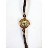 Lady's 9ct Buren gold wristwatch with leather strap