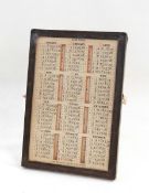 Perpetual calendar of rectangular form, in a silver easel frame, Birmingham 1917, 24.