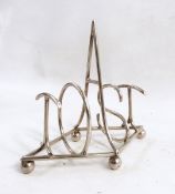 Victorian silver toast rack, four division, the bars spelling 'TOAST', 14 cms,