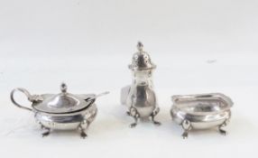 Set of three silver condiments, with cut glass borders raised on pad feet, salt pepper and mustard,