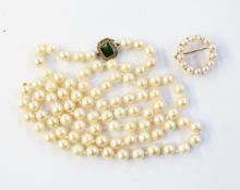 String of cultured pearls with white metal clasp and a gold and pearl circlet brooch