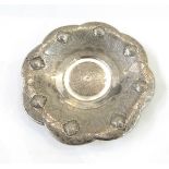 Persian white metal dish of lobed circular form,