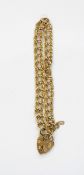 Gold-coloured double-curb link bracelet,