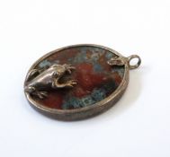 Silver and agate pendant in the form of a frog on a lily pad,