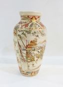 Japanese pottery Satsuma vase decorated with panels of Japanese male figures on a veranda,