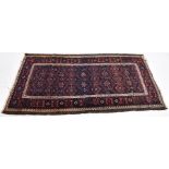 An Antique Persian Rug