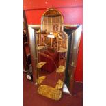 A gold painted birdcage style mirror wit