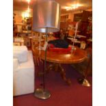 A designer floor standing lamp with shad