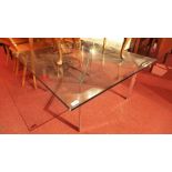 A Barcelona table designed by Mile Van Der Rohe 1929 and made by Knoll Studio, signed to the